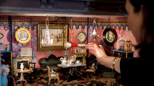 Conservator restoring Beatrix Potter’s Doll’s House at Hill Top, Cumbria, including items that appear in Beatrix Potter's The Tale of Two Bad Mice